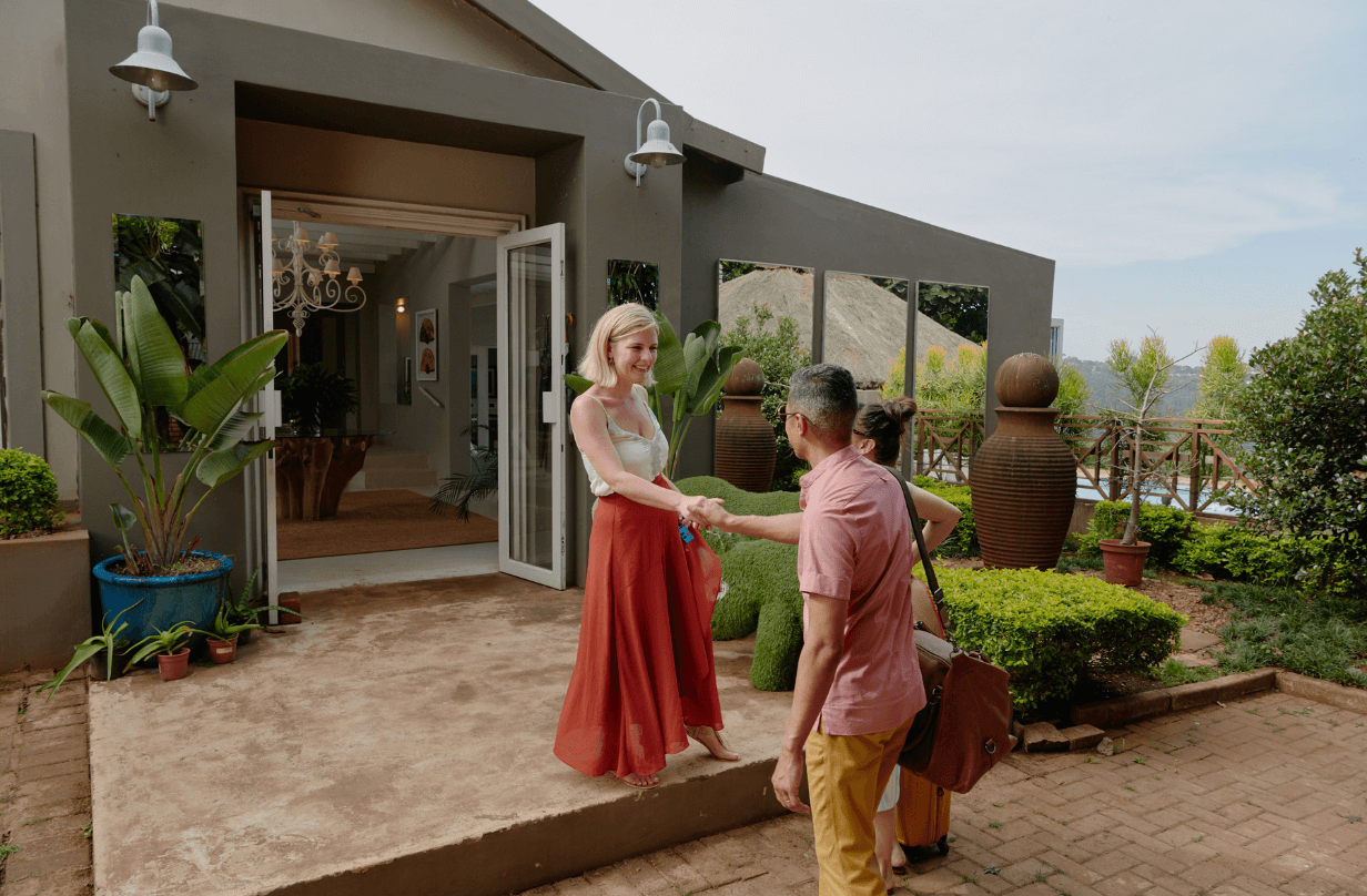 airbnb host greeting guest