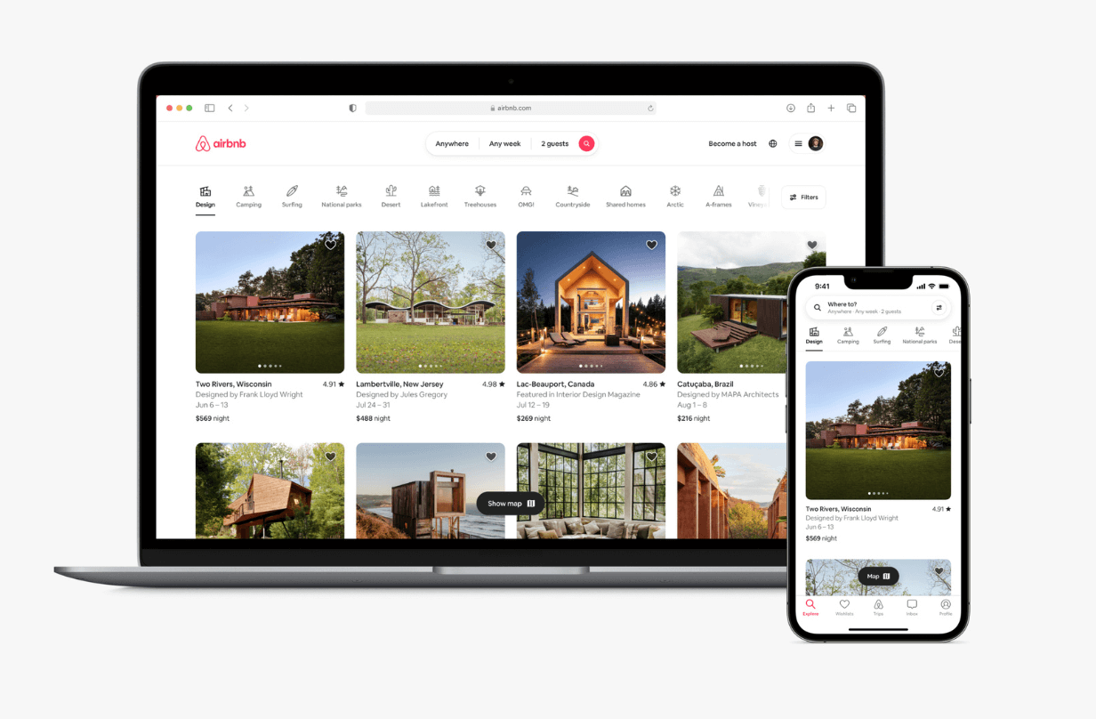 Airbnb homepage on laptop and phone