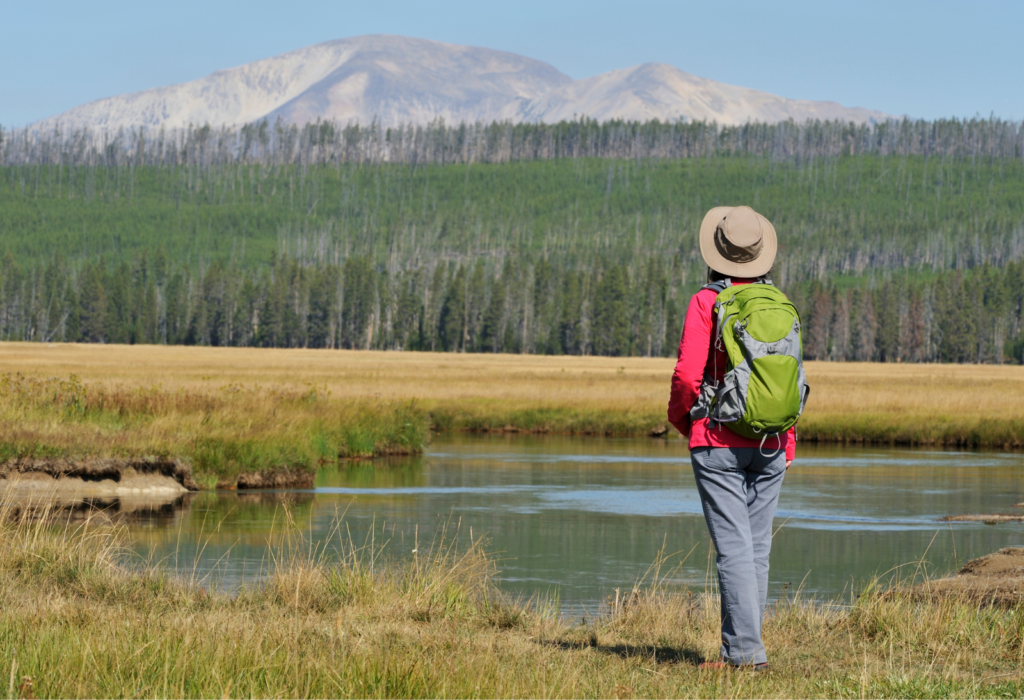 hike yellowstone enjoying mountain view