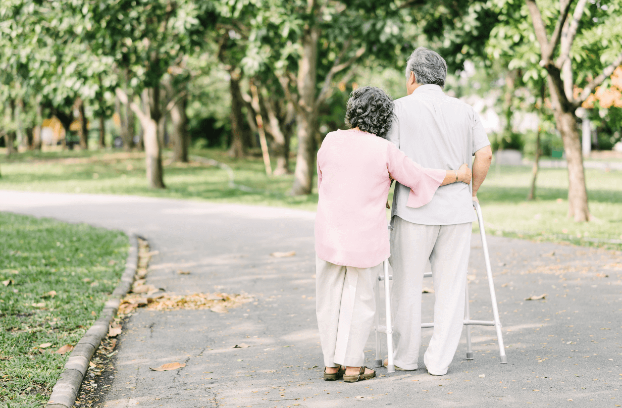 elderly couple walking