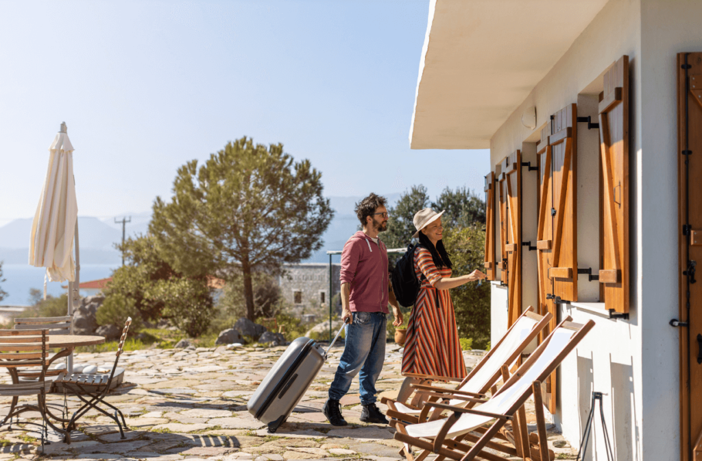 Couple arriving at airbnb