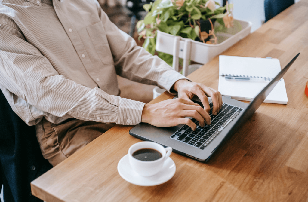 Person working on laptop remote work