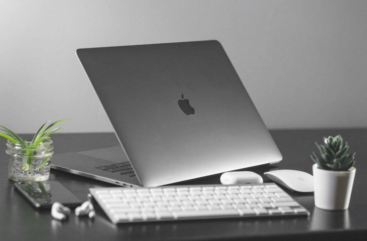 macbook with desk setup