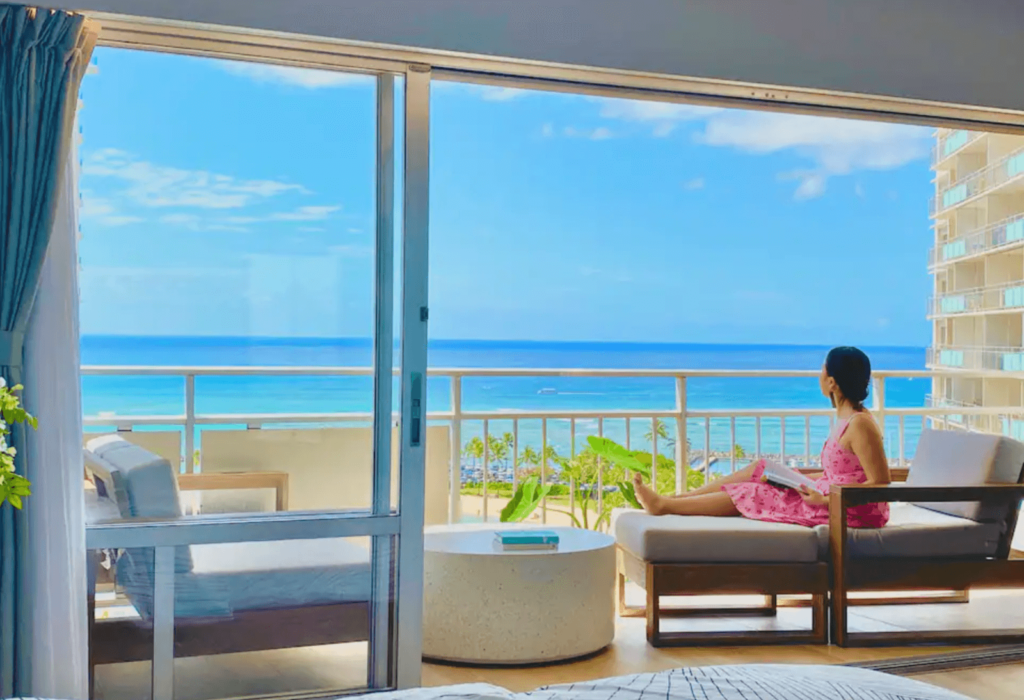 woman enjoying ocean front view