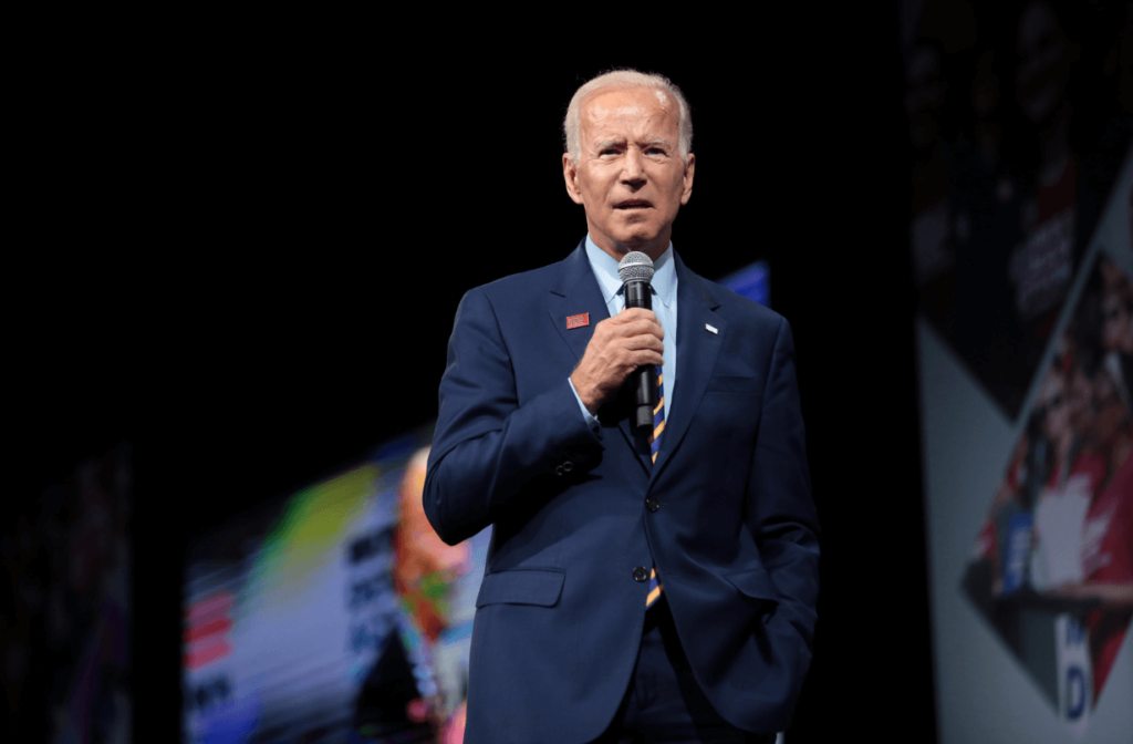 joe biden holding microphone