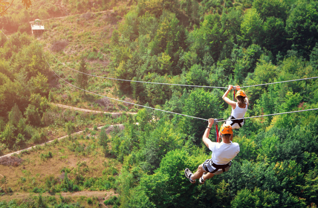 two people ziplining