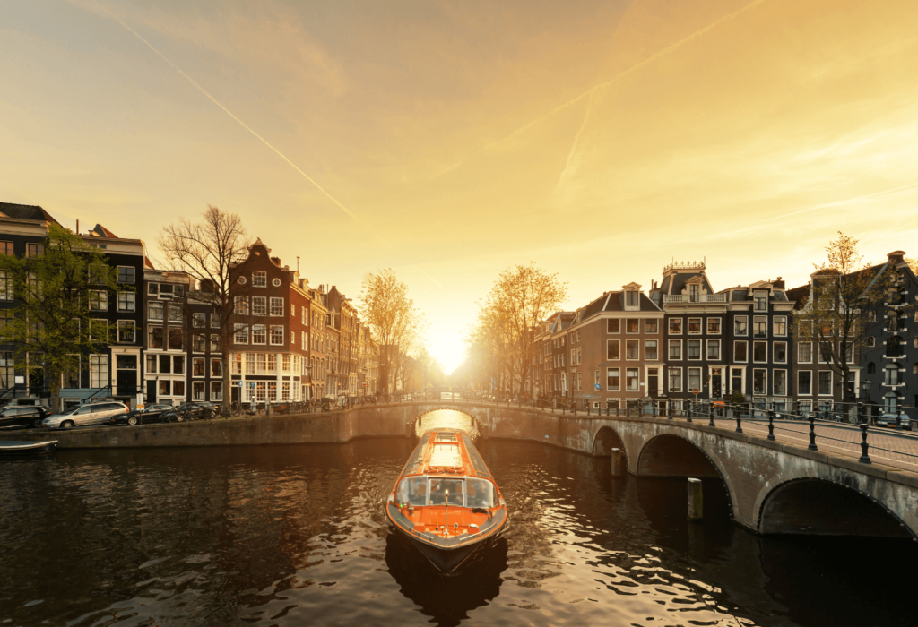 boat in canal amsterdam