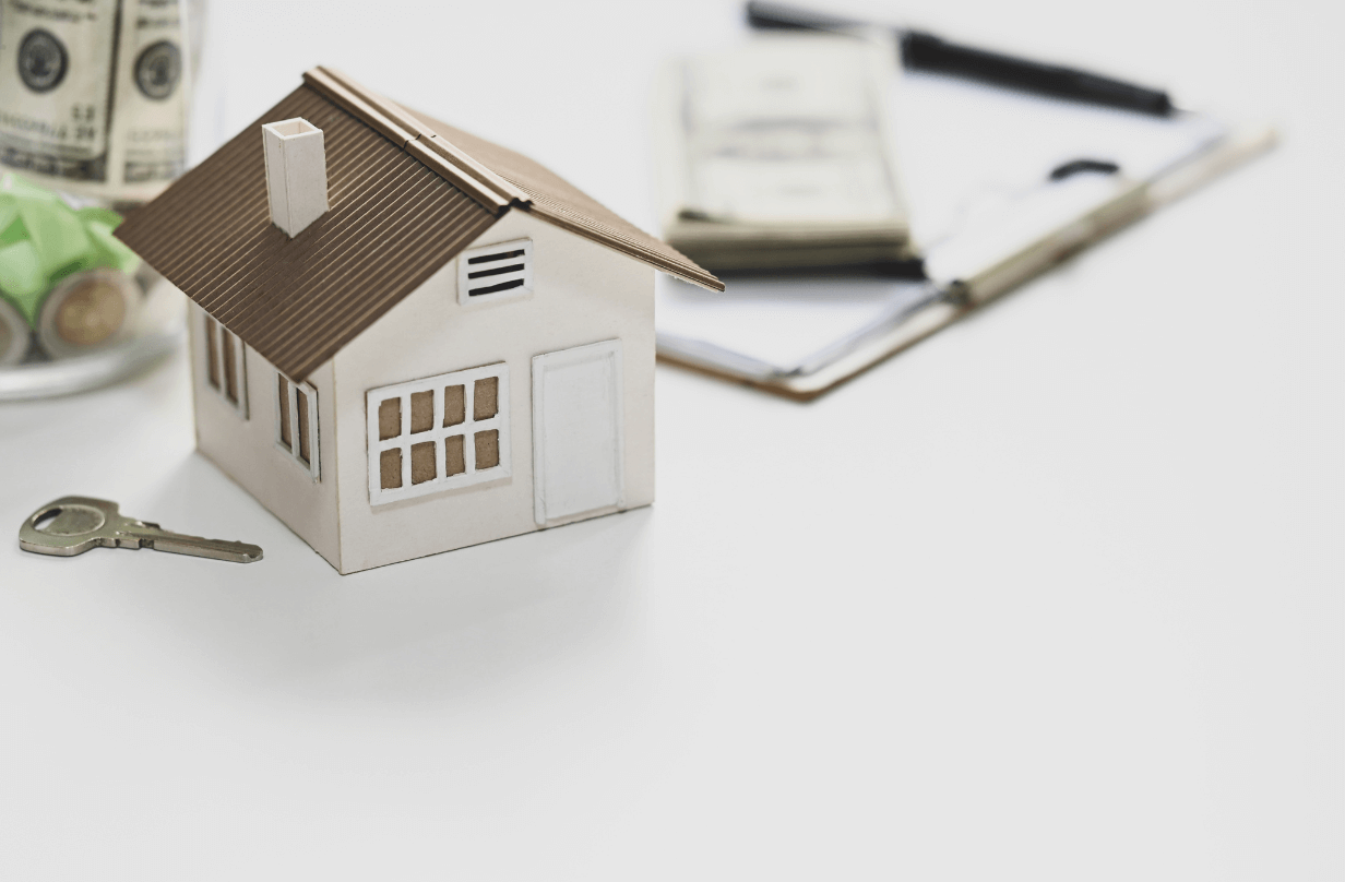 tiny scale house on desk