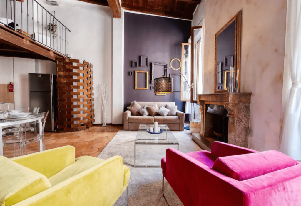 living room colorful couches bologna airbnb