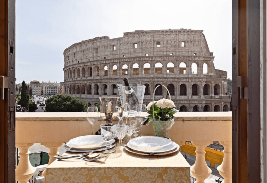 view of colosseum rome from airbnb patio