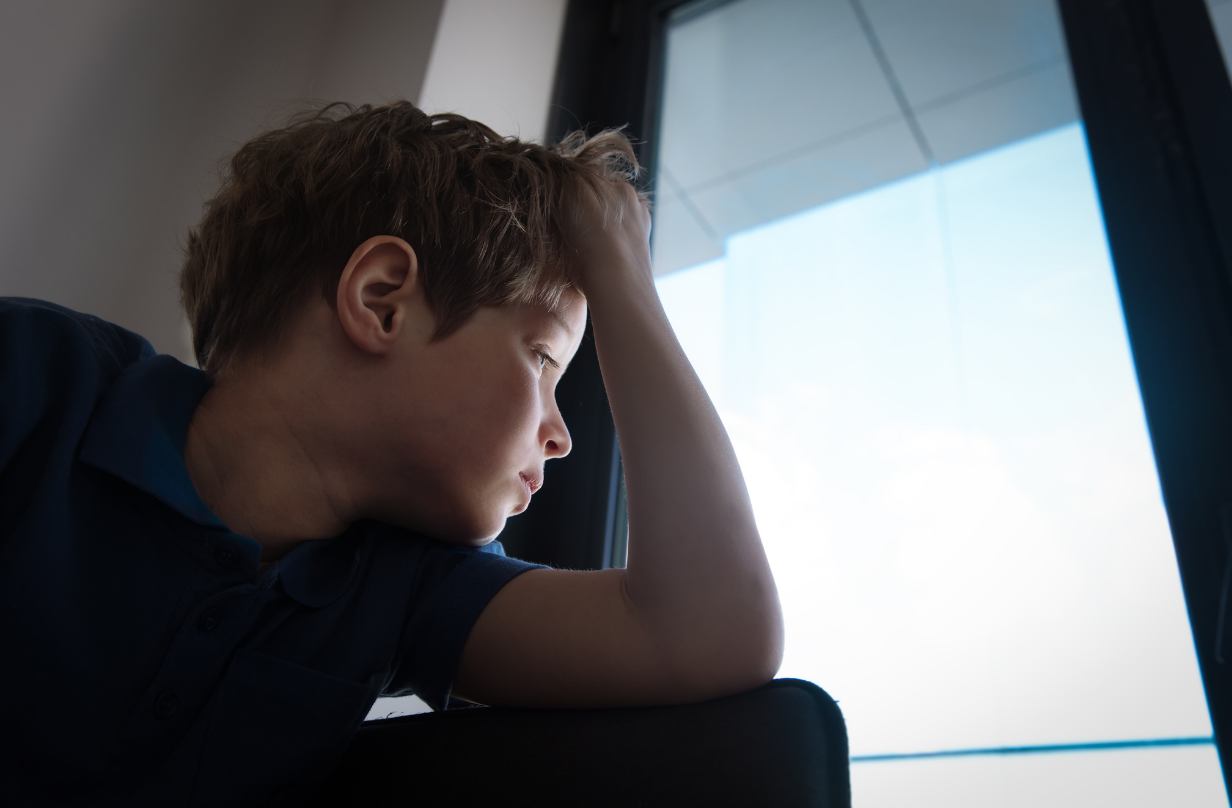 kid looking out window