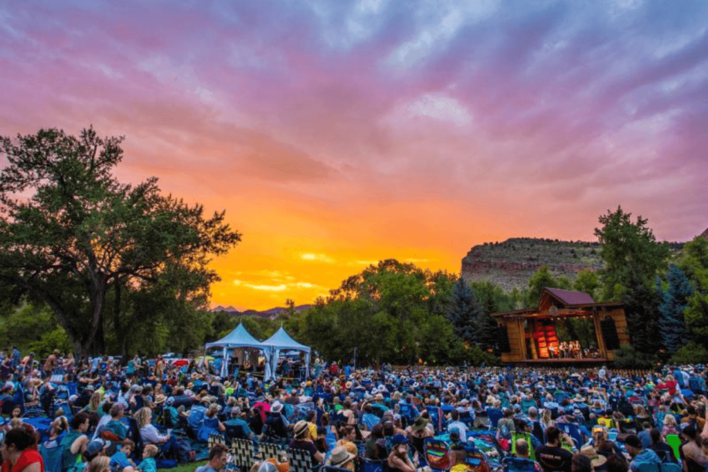 festival crowd at sunset outdoors