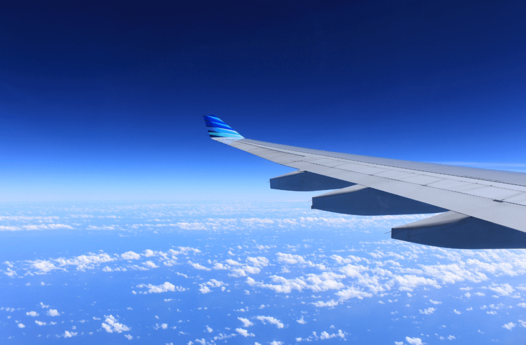 plane wing view from sky