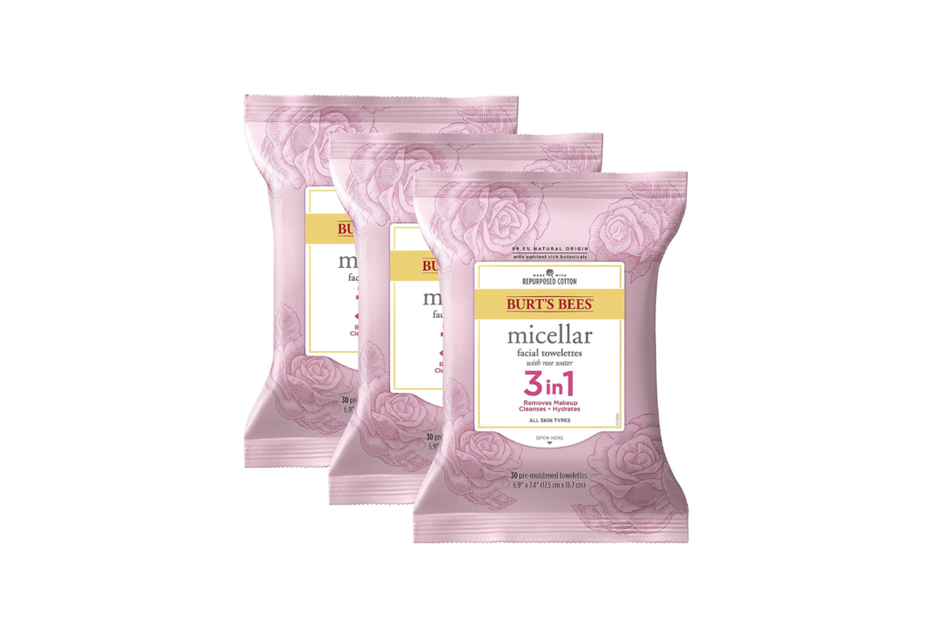 three pink packages of facial cleansing wipes