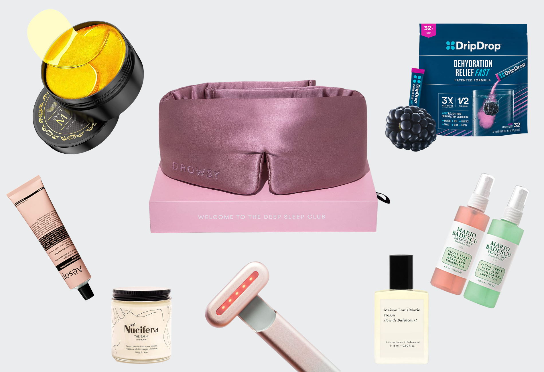 travel products dispersed on page, including pink sleep mask, perfume bottle, and bottle of oil