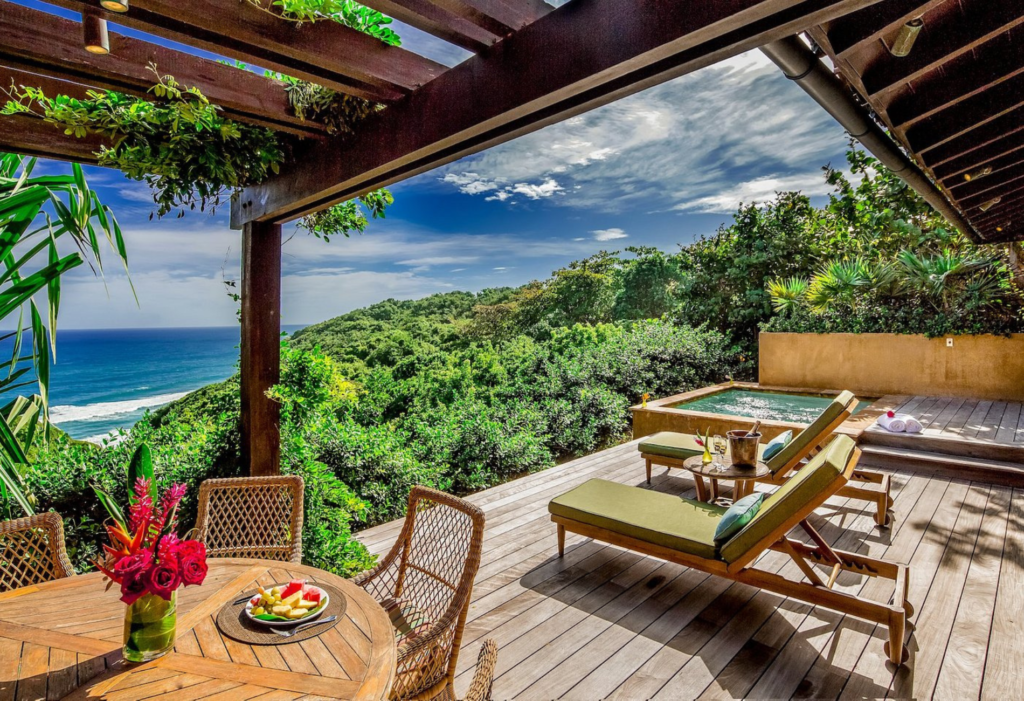 Best hotels in Puerto Rico: hotel room with large deck and view of the ocean