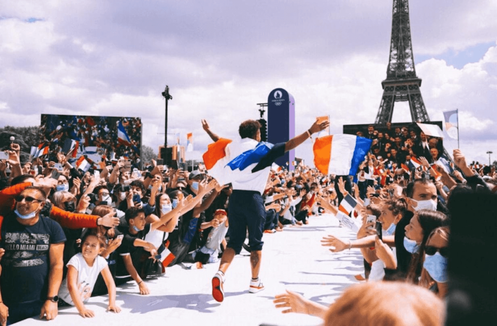 person running with french flag