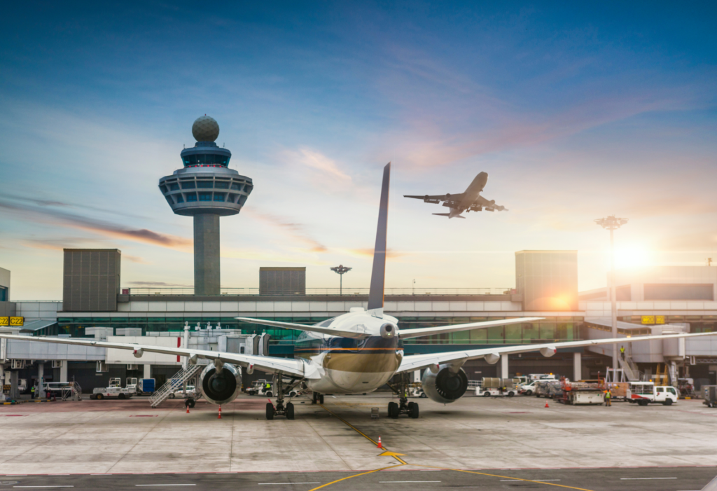 London Heathrow Airport view with airplanes and tower