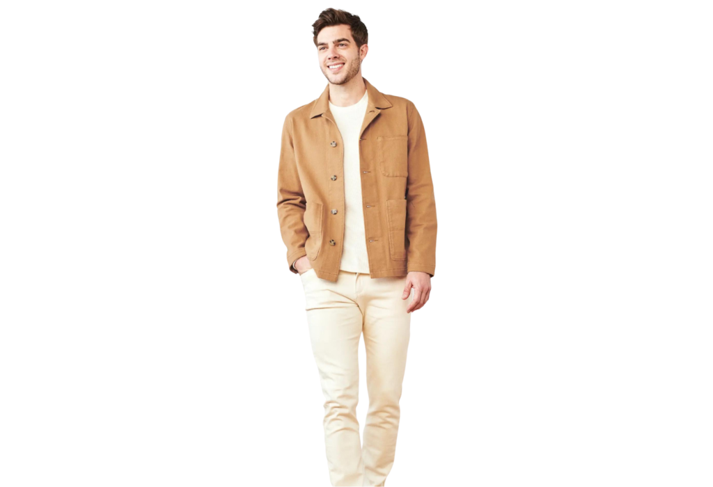 camel color button down with white pants on a man