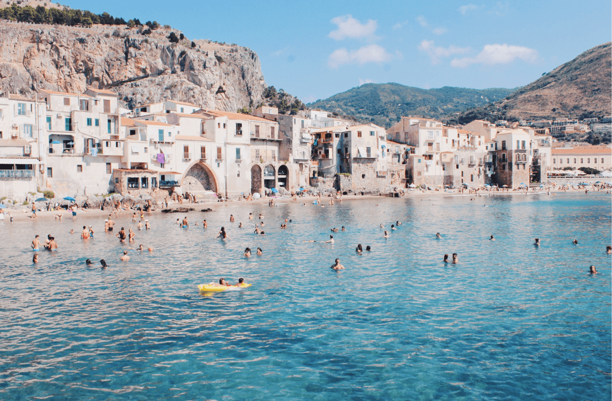 sicily italy water and buildings in background