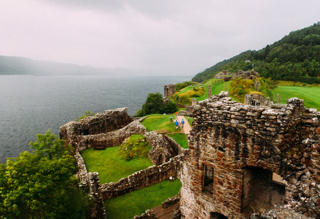 coastal Scotland, view of the Scottish Highlands with immense greenery and castle-like structures