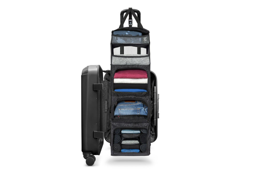 black suitcase that has storage compartments