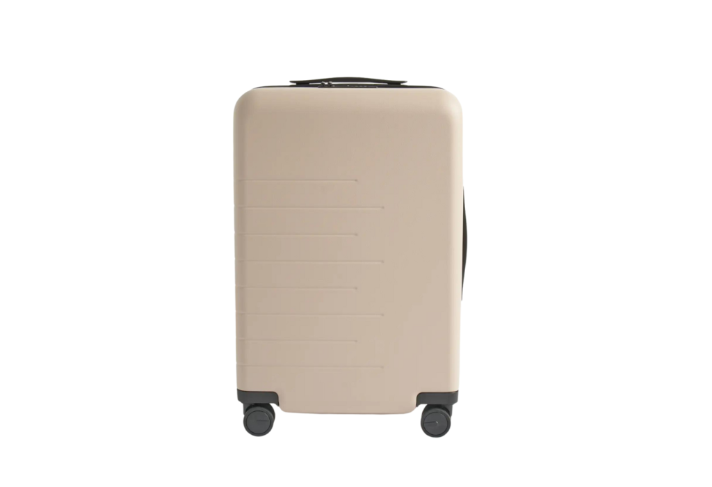 tan spinner suitcase