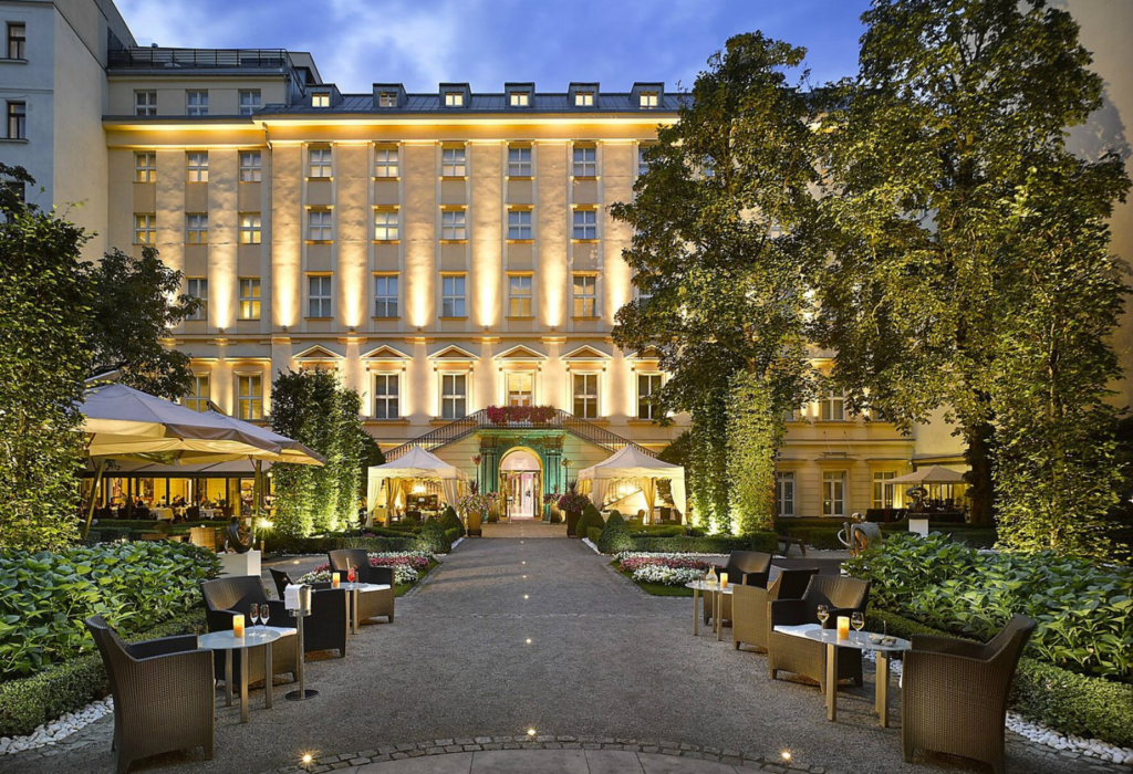 long paved entryway with a view of the front of Grand Mark Hotel in Prague