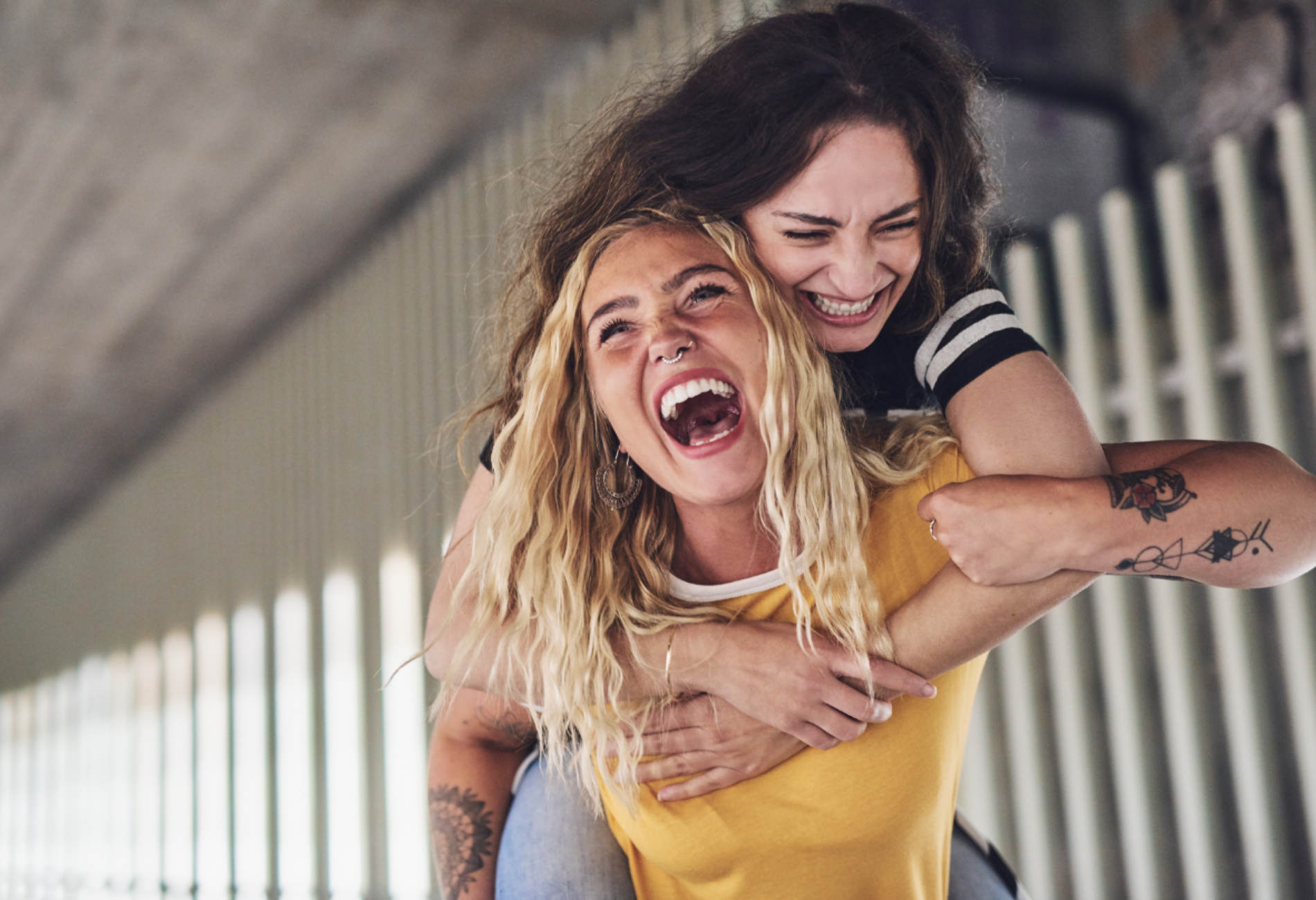 two girls laughing