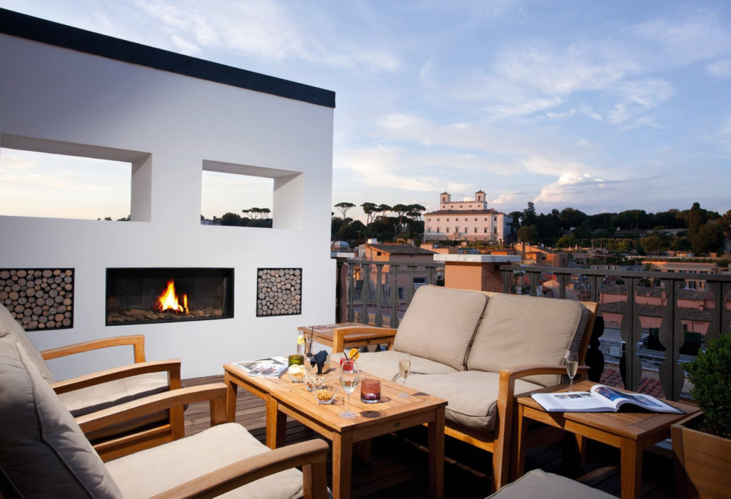 rooftop with fireplace at Portrait Roma