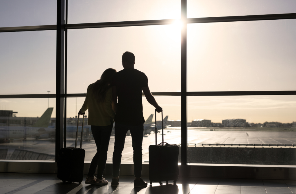 people waiting at the airport terminal