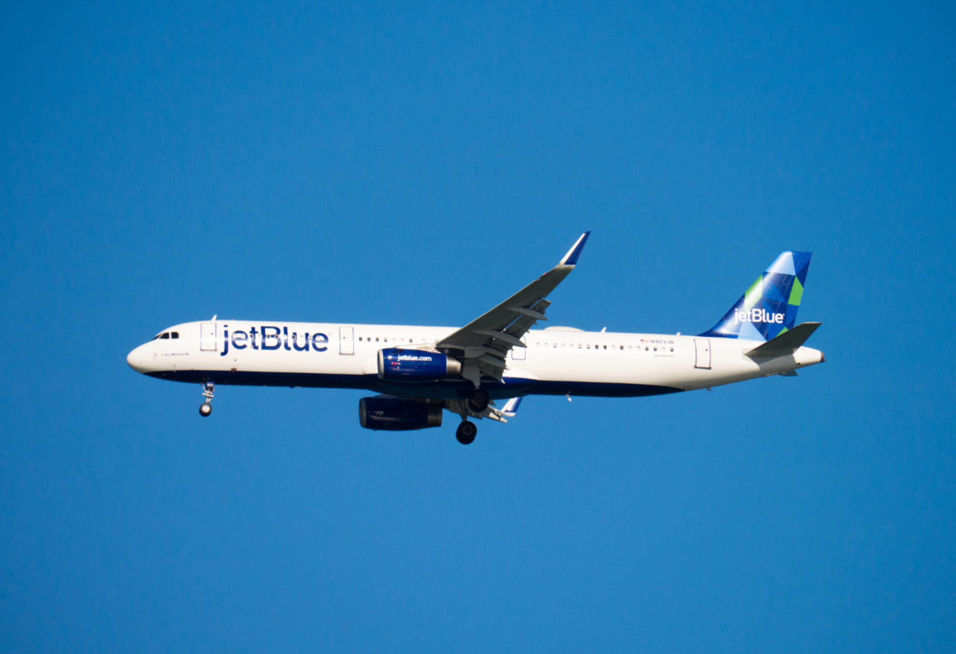 JetBlue plane in sky for story on jetblue sale on TrueBlue points
