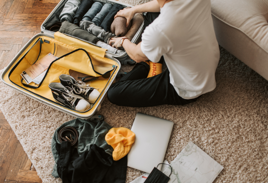 person packing their suitcase