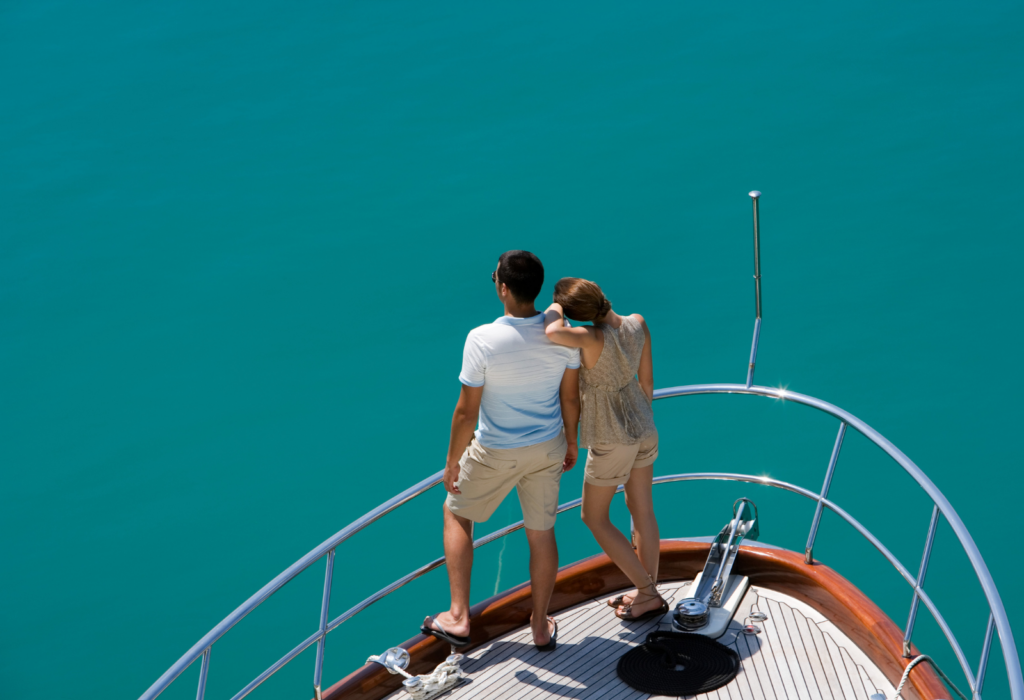 two people on a yacht