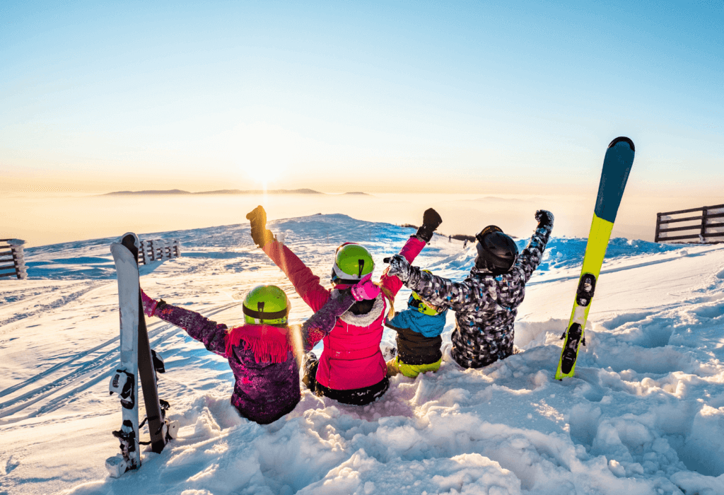 a family enjoy a day of skiing