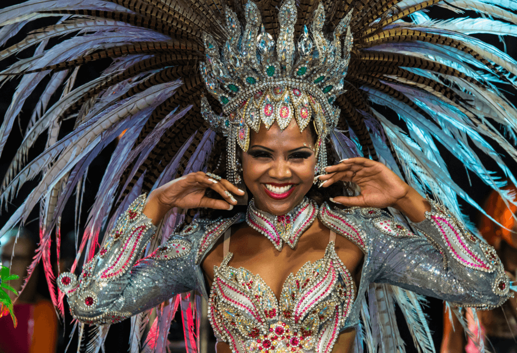 woman at Carnival in Brazil for story on Airbnb's 2024 travel predictions