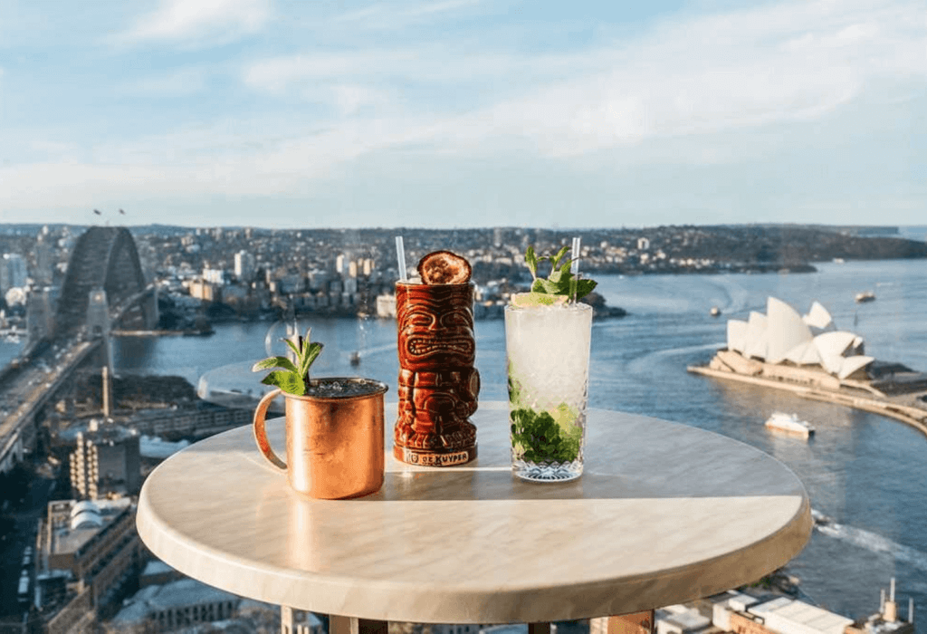 three cocktails on the table of the shangri la Sydney HAarbor