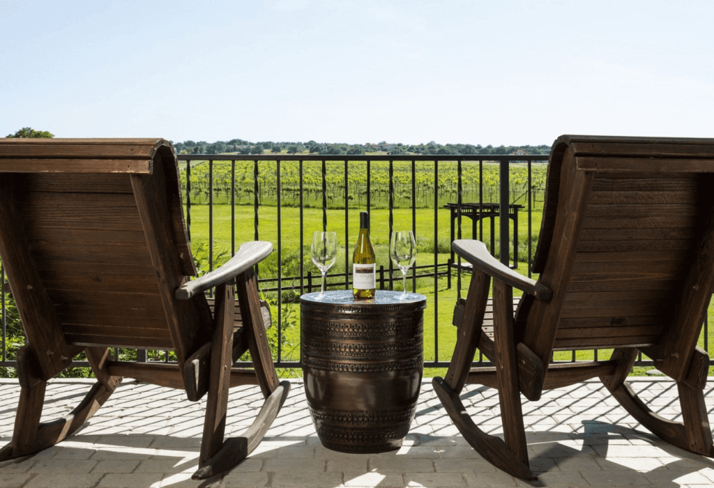 the balcony view from a room in the vineyard at florence for The Best Romantic Hotels Near Me