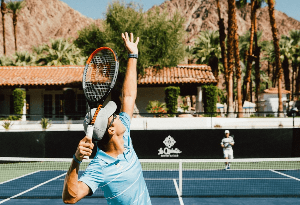 A man playing tennis at La Quinta resort