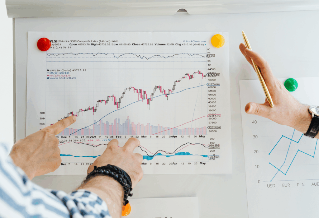 two people looking at a stock