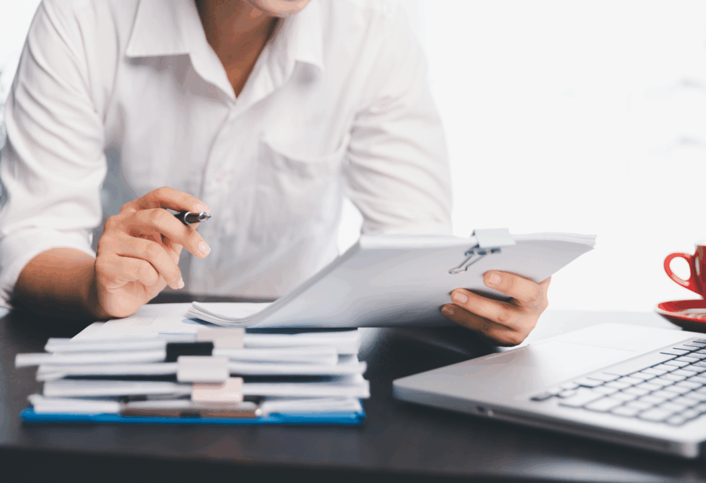 a person looking at documents