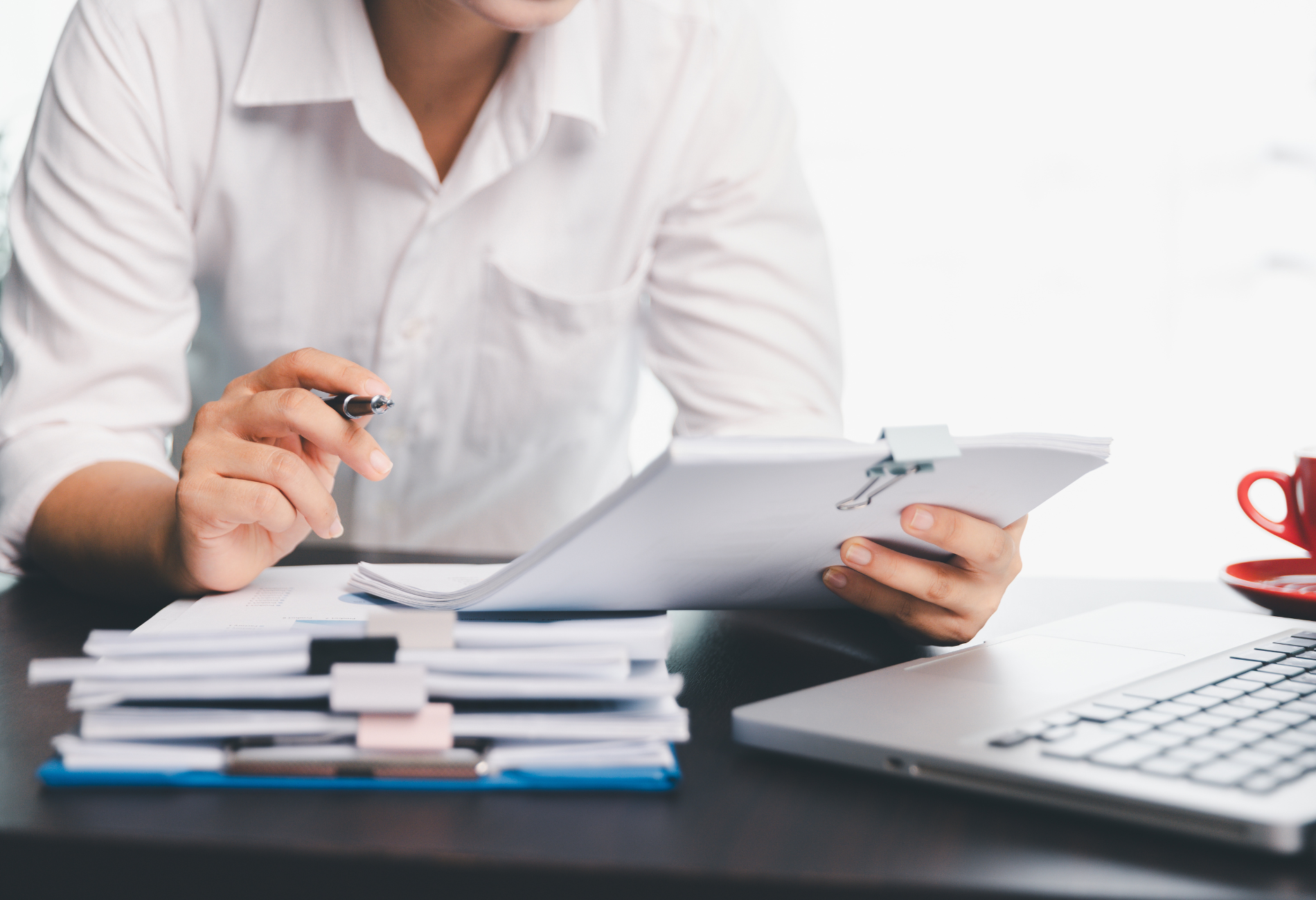 a person looking at documents