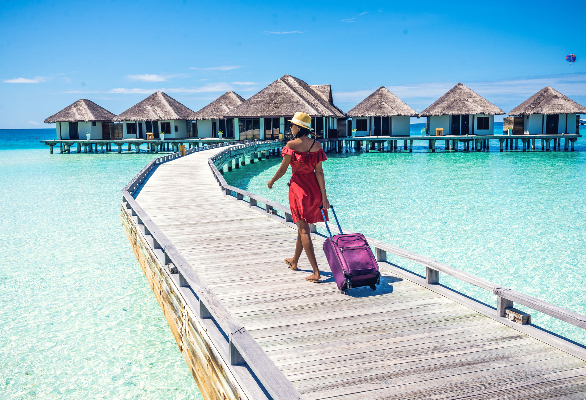 person with suitcase on vacation