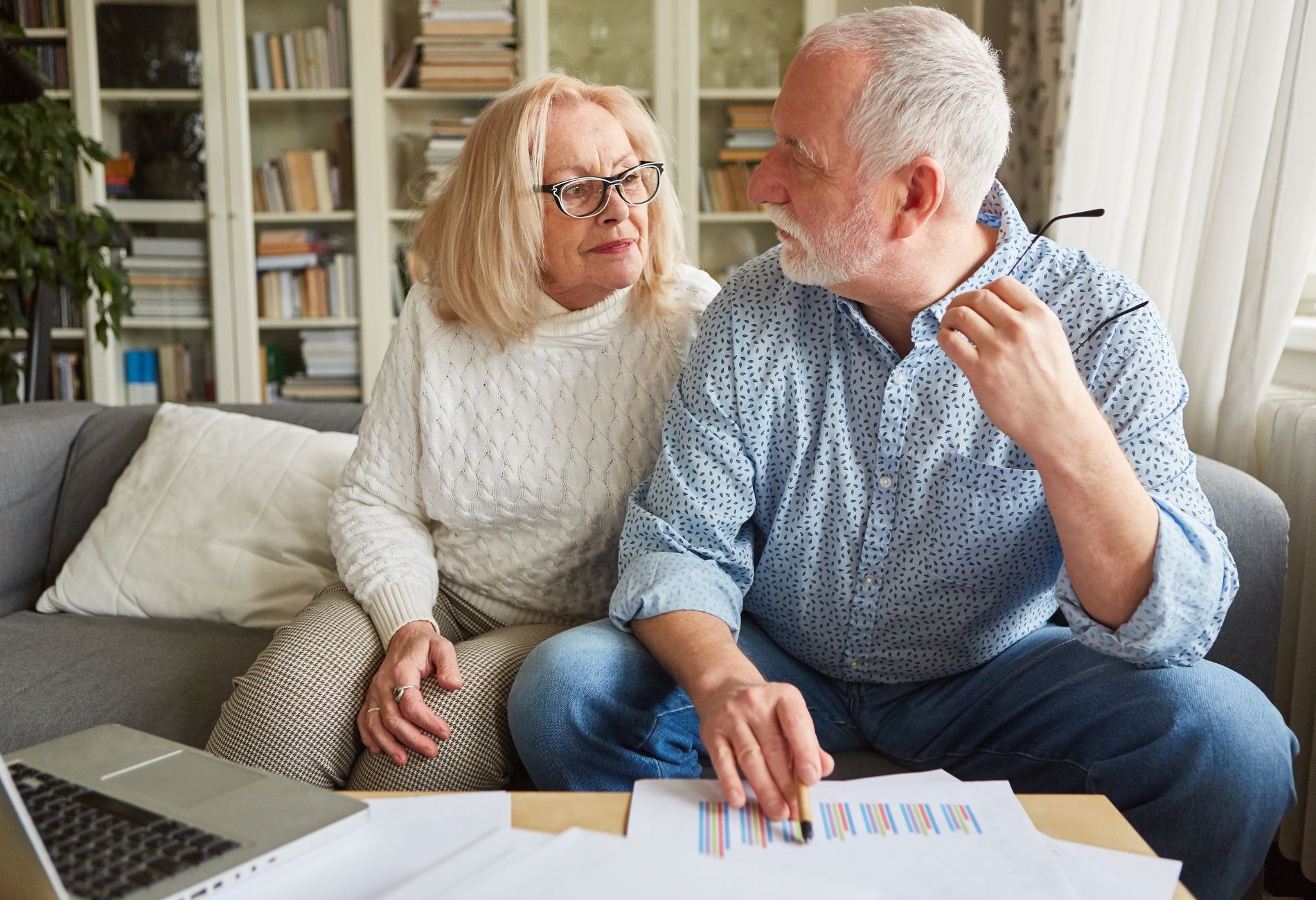2 people looking at finances