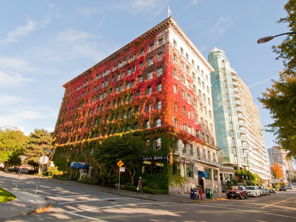 exterior of hotel covered in vines for article on the best hotels in Vancouver