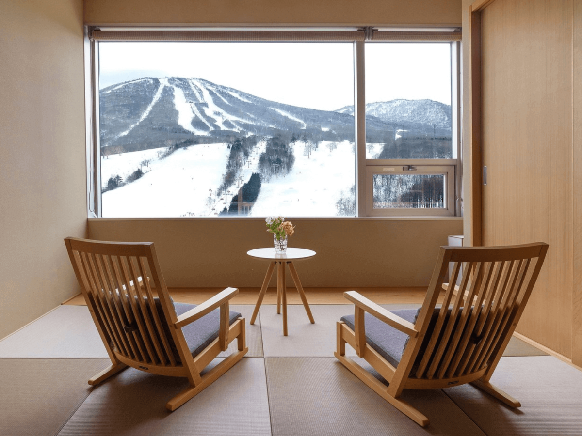 two chairs looking out over the slopes at Crowne Plaza ANA Resort Appi Kogen