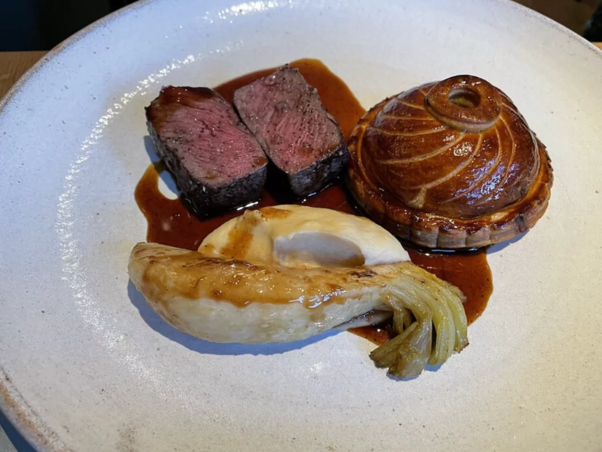 dinner plate with meat at one of the best restaurants in Edinburgh