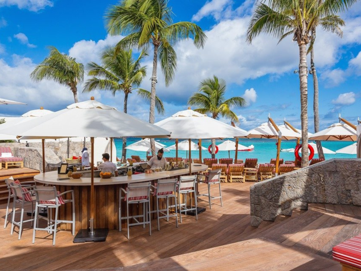 outdoor pool deck and restaurant overlooking Caribbean in St. Bart